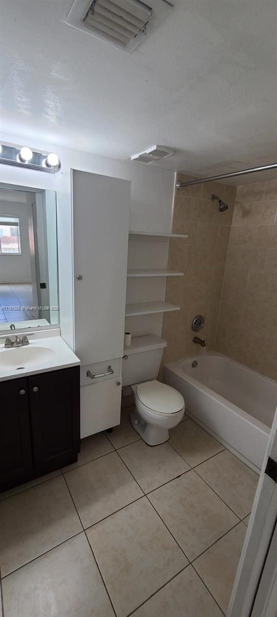 15231 SW 80th St Unit 209, Miami, FL 33193 - full bath featuring washtub / shower combination, vanity, toilet, and tile patterned flooring