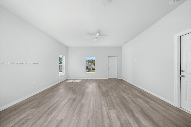 1429 Las Villas Blvd, Sebring, FL 33870 - empty room featuring a ceiling fan and light wood-style floors