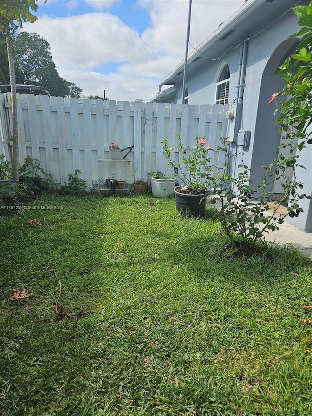 view of yard with fence