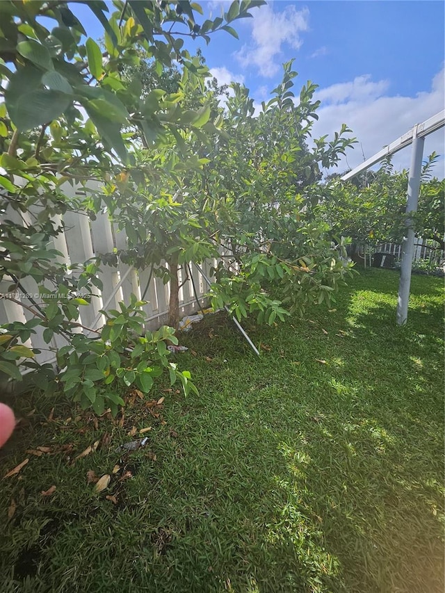 view of yard with fence