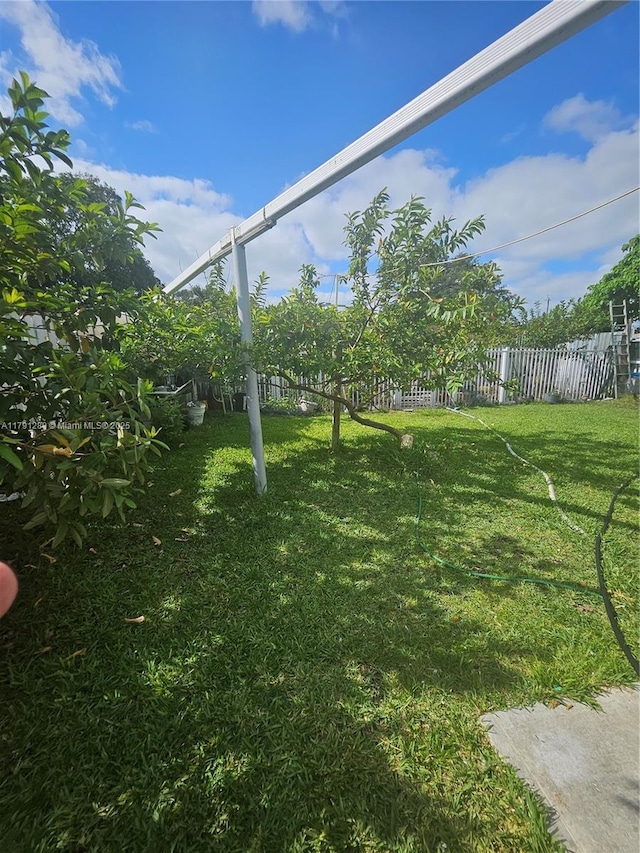 view of yard with fence