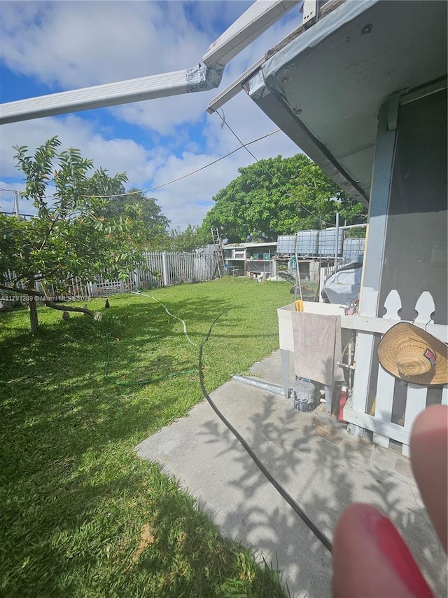 view of yard featuring fence