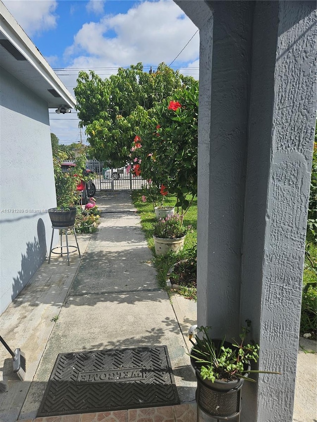 view of home's community with fence