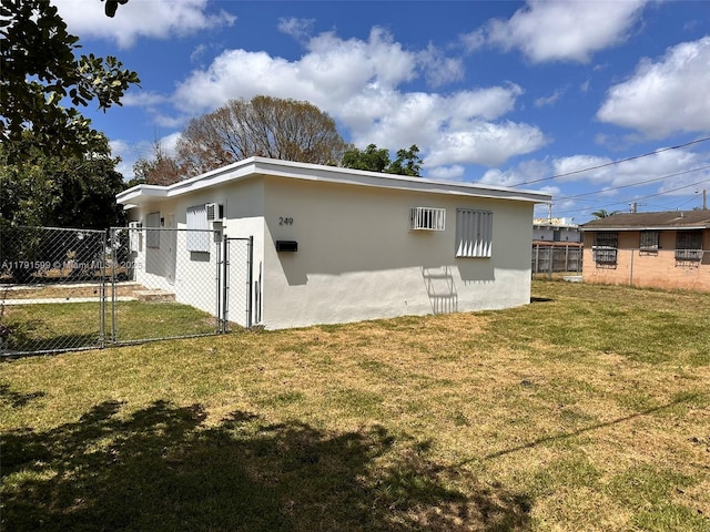 249 SW 4th Ct, Homestead, FL 33030 - back of house with a gate