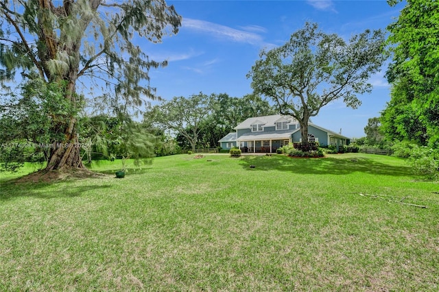 view of yard featuring fence