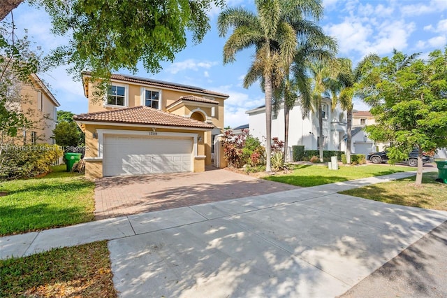 13119 SW 29th St, Miramar, FL 33027 - mediterranean / spanish-style house featuring stucco siding, roof mounted solar panels, decorative driveway, a front lawn, and a tile roof