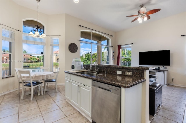 13119 SW 29th St, Miramar, FL 33027 - kitchen with dishwasher, a chandelier, light tile patterned floors, white cabinets, and ceiling fan