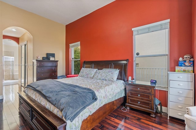 13119 SW 29th St, Miramar, FL 33027 - bedroom featuring dark wood finished floors and arched walkways