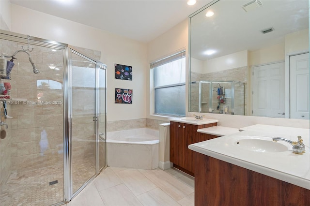 13119 SW 29th St, Miramar, FL 33027 - full bath featuring a garden tub, vanity, a stall shower, and tile patterned floors