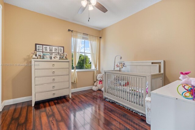 13119 SW 29th St, Miramar, FL 33027 - bedroom featuring wood finished floors, a crib, and ceiling fan