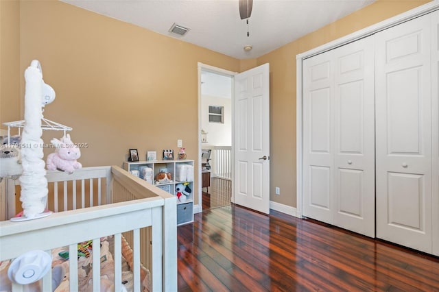 13119 SW 29th St, Miramar, FL 33027 - bedroom featuring hardwood / wood-style floors, a closet, a nursery area, and a ceiling fan