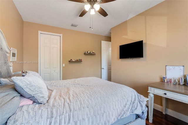13119 SW 29th St, Miramar, FL 33027 - bedroom with a closet, dark wood-style flooring, and ceiling fan