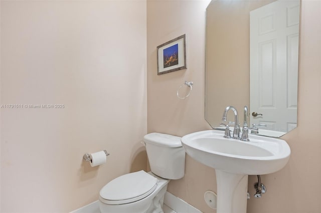 13119 SW 29th St, Miramar, FL 33027 - bathroom featuring toilet and baseboards