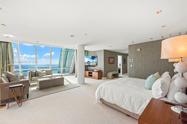 17121 Collins Ave Unit Ph4806, Sunny Isles Beach, FL 33160 - bedroom featuring light colored carpet, access to exterior, and wallpapered walls