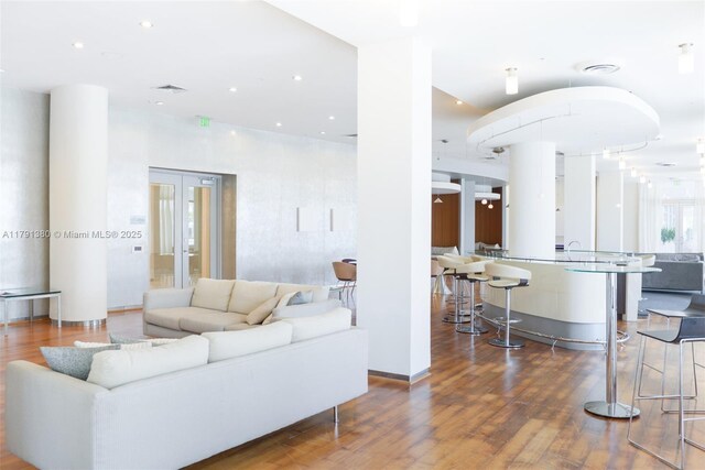 10275 Collins Ave Unit 219, Bal Harbour, FL 33154 - living room featuring recessed lighting and wood finished floors