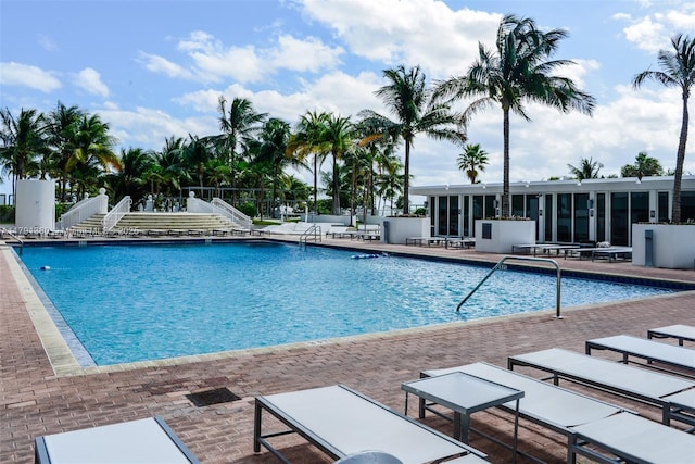 10275 Collins Ave Unit 219, Bal Harbour, FL 33154 - pool with fence and a patio area
