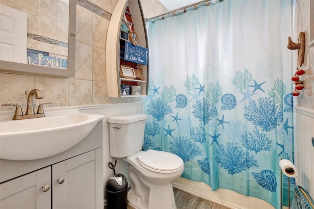17501 NW 85th Ave, Hialeah, FL 33015 - full bath with vanity, wood finished floors, and tile walls