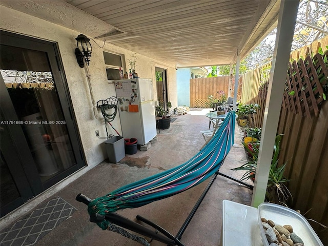 11537 SW 6th St, Sweetwater, FL 33174 - view of patio / terrace featuring fence