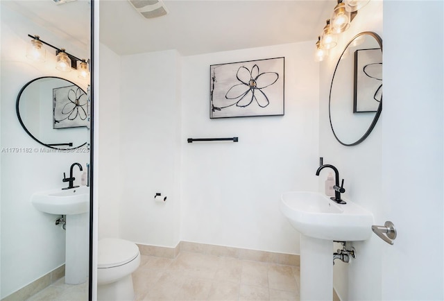 1900 N Bayshore Dr Unit 2816, Miami, FL 33132 - bathroom with baseboards, tile patterned floors, and toilet