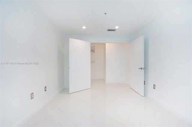 1900 N Bayshore Dr Unit 2816, Miami, FL 33132 - unfurnished bedroom with recessed lighting, baseboards, and light tile patterned floors