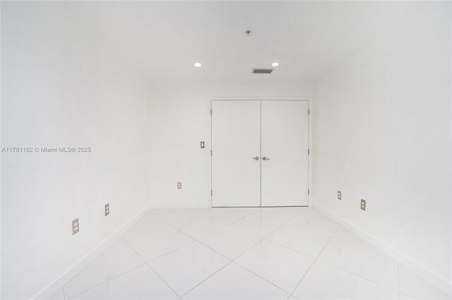 1900 N Bayshore Dr Unit 2816, Miami, FL 33132 - spare room with recessed lighting, baseboards, and light tile patterned floors