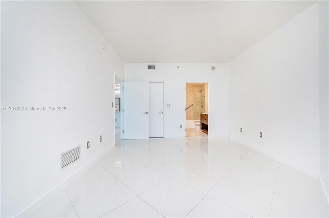 1900 N Bayshore Dr Unit 2816, Miami, FL 33132 - tiled spare room with baseboards