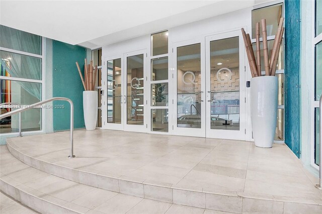 1900 N Bayshore Dr Unit 2816, Miami, FL 33132 - view of patio / terrace with french doors and water heater