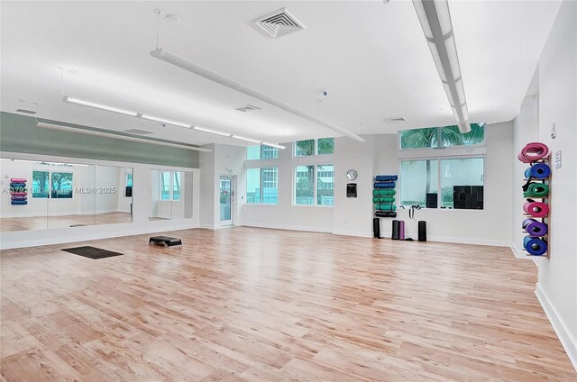 1900 N Bayshore Dr Unit 2816, Miami, FL 33132 - workout area with light wood-style flooring and baseboards