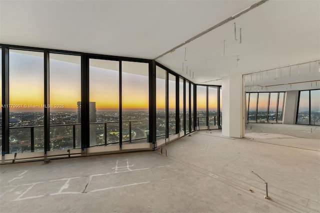 1000 Biscayne Blvd Unit 5801, Miami, FL 33132 - spare room with expansive windows, healthy amount of natural light, and unfinished concrete floors