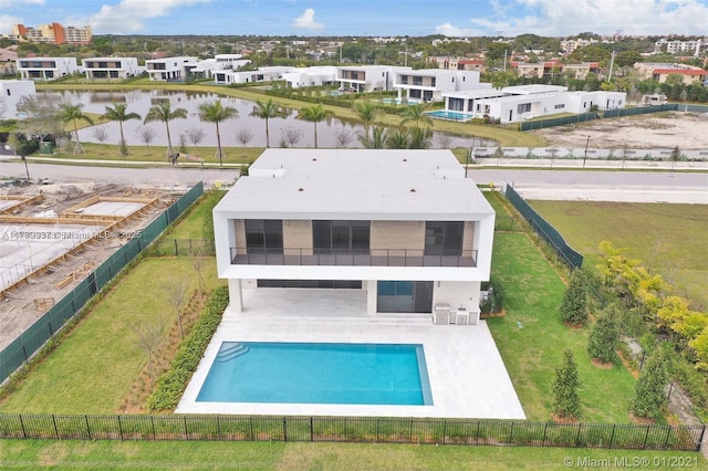 16512 Botaniko Dr S, Weston, FL 33326 - exterior space featuring a yard, a water view, a sunroom, and a patio area