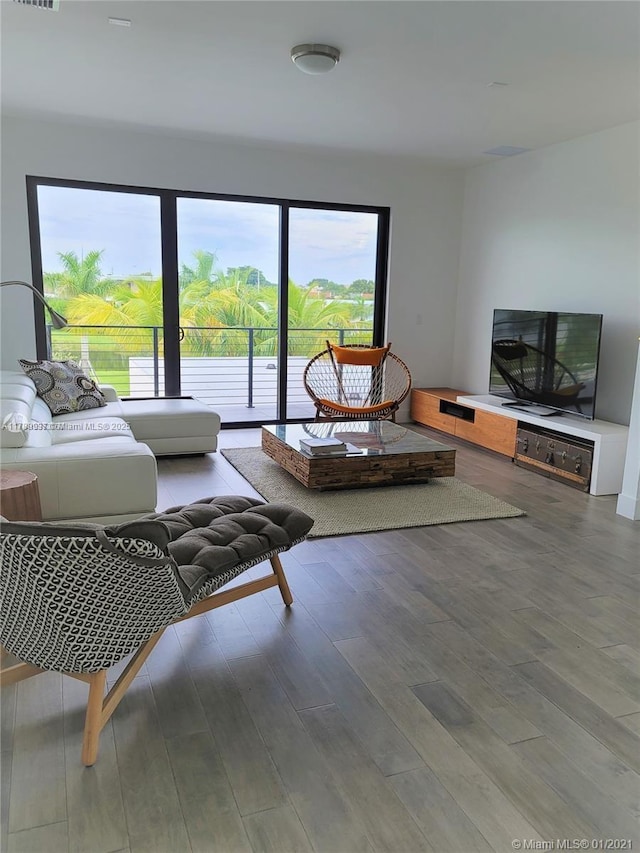 16512 Botaniko Dr S, Weston, FL 33326 - living area featuring wood finished floors