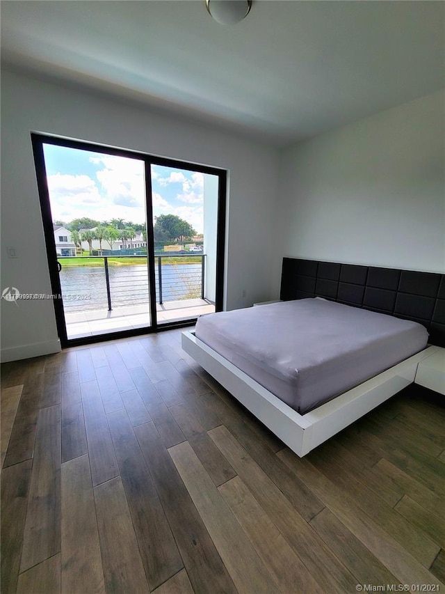 16512 Botaniko Dr S, Weston, FL 33326 - bedroom featuring dark wood-style flooring and access to exterior