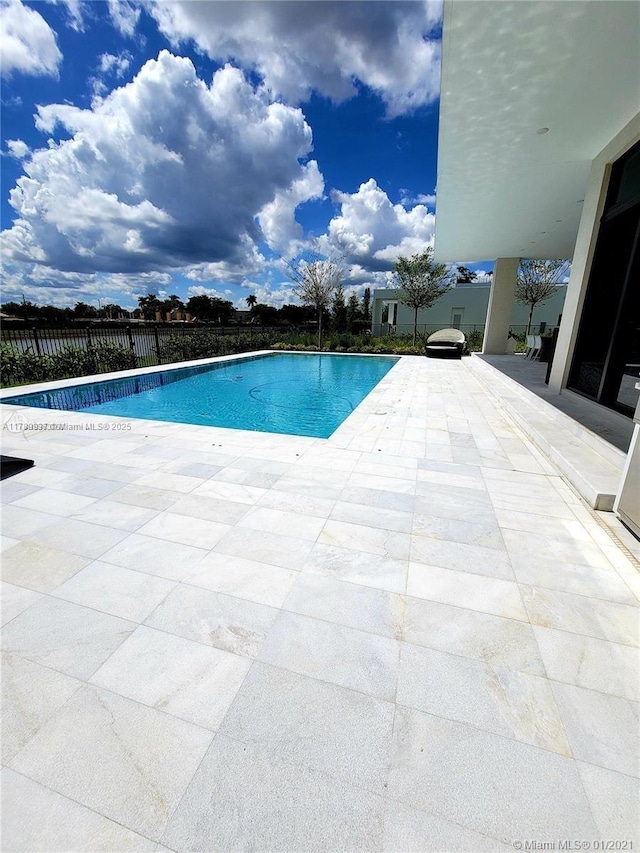 16512 Botaniko Dr S, Weston, FL 33326 - view of pool featuring fence, a patio area, and a fenced in pool