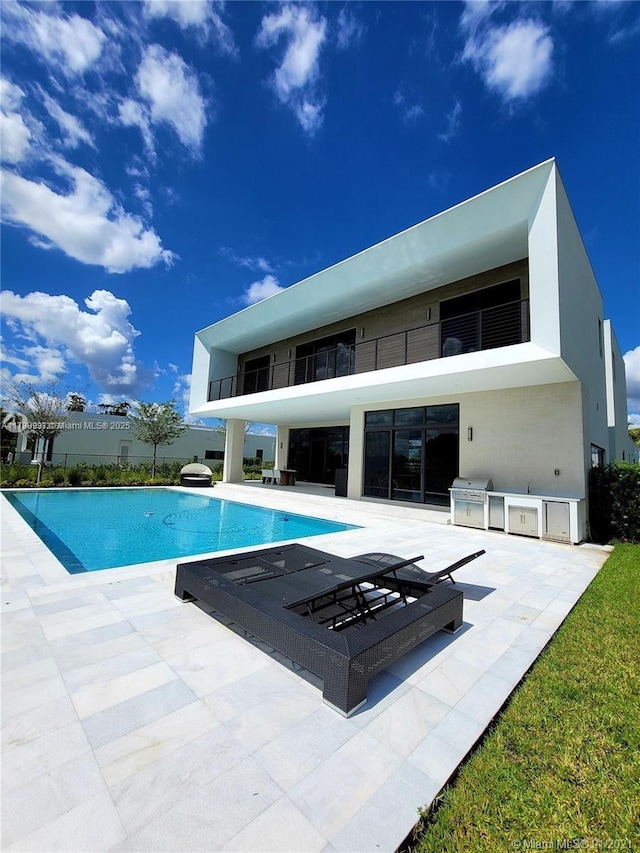 16512 Botaniko Dr S, Weston, FL 33326 - outdoor pool featuring area for grilling and a patio area