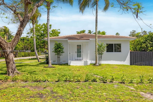 701 NE 119th St, Biscayne Park, FL 33161 - view of front facade with stucco siding