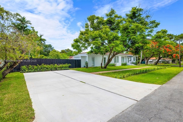 701 NE 119th St, Biscayne Park, FL 33161 - view of patio / terrace with concrete driveway