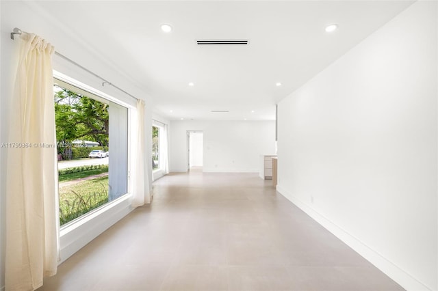701 NE 119th St, Biscayne Park, FL 33161 - hall with recessed lighting and baseboards