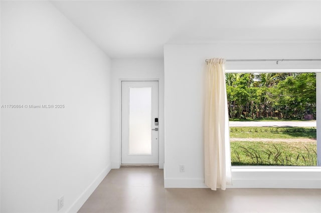 701 NE 119th St, Biscayne Park, FL 33161 - foyer featuring baseboards