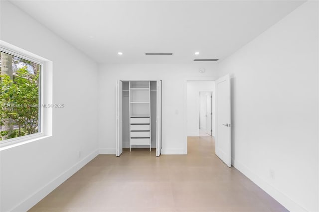 701 NE 119th St, Biscayne Park, FL 33161 - unfurnished bedroom with recessed lighting, baseboards, and a closet