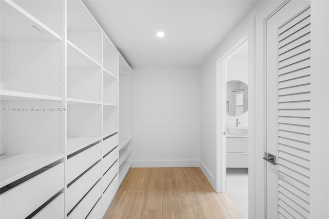 701 NE 119th St, Biscayne Park, FL 33161 - spacious closet with light wood finished floors