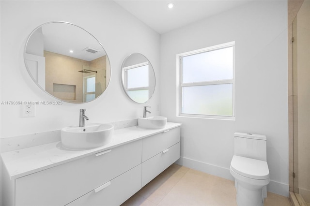 701 NE 119th St, Biscayne Park, FL 33161 - full bathroom with double vanity, a shower with shower door, baseboards, toilet, and recessed lighting