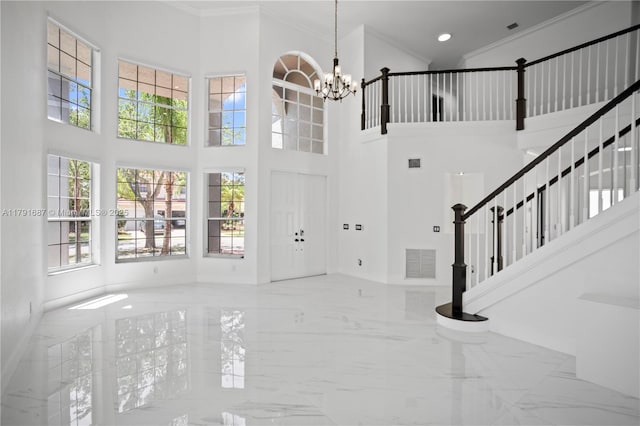 17937 SW 36th St, Miramar, FL 33029 - foyer featuring crown molding, baseboards, a chandelier, and marble finish floor