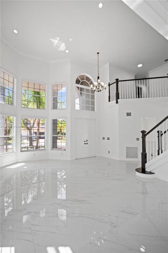 17937 SW 36th St, Miramar, FL 33029 - interior space with visible vents, ornamental molding, a towering ceiling, stairway, and a notable chandelier