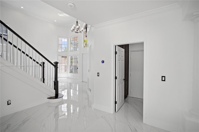 17937 SW 36th St, Miramar, FL 33029 - foyer with a notable chandelier, marble finish floor, stairs, baseboards, and ornamental molding