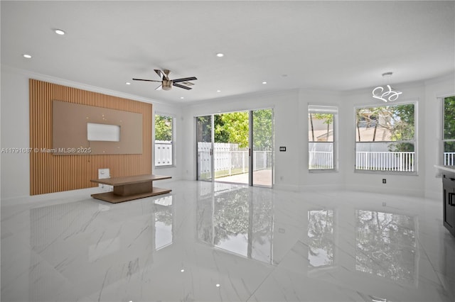 17937 SW 36th St, Miramar, FL 33029 - unfurnished living room featuring crown molding, recessed lighting, marble finish floor, and ceiling fan with notable chandelier
