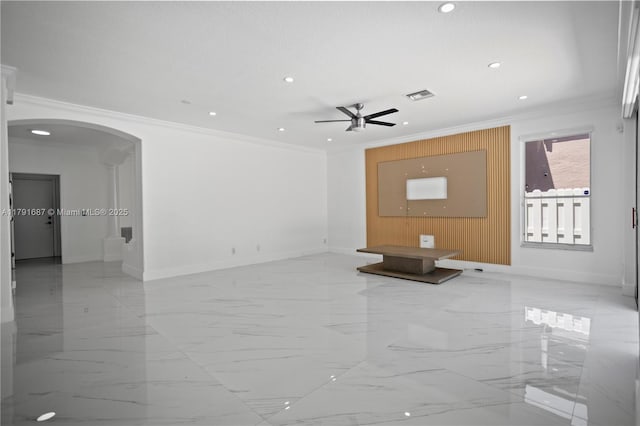 17937 SW 36th St, Miramar, FL 33029 - unfurnished living room featuring crown molding, arched walkways, marble finish floor, and baseboards