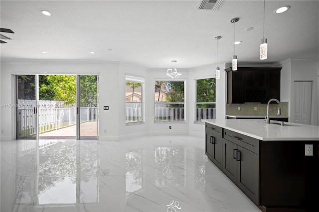 17937 SW 36th St, Miramar, FL 33029 - kitchen with visible vents, a sink, light countertops, marble finish floor, and recessed lighting
