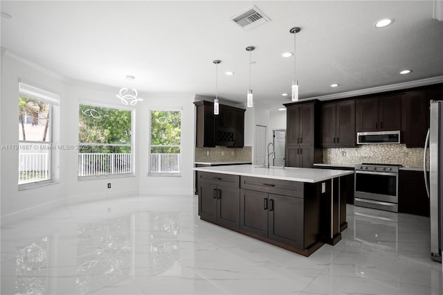 17937 SW 36th St, Miramar, FL 33029 - kitchen featuring visible vents, decorative backsplash, marble finish floor, and appliances with stainless steel finishes
