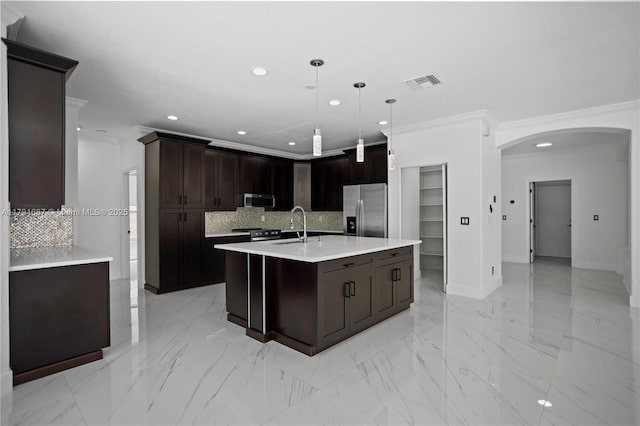 17937 SW 36th St, Miramar, FL 33029 - kitchen featuring visible vents, appliances with stainless steel finishes, arched walkways, light countertops, and recessed lighting