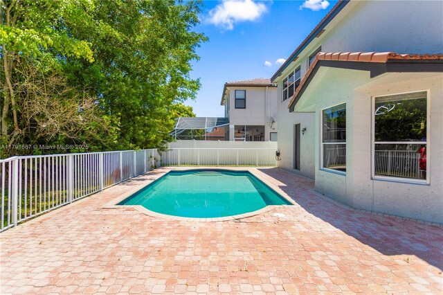 17937 SW 36th St, Miramar, FL 33029 - view of swimming pool with a fenced in pool, a fenced backyard, and a patio area